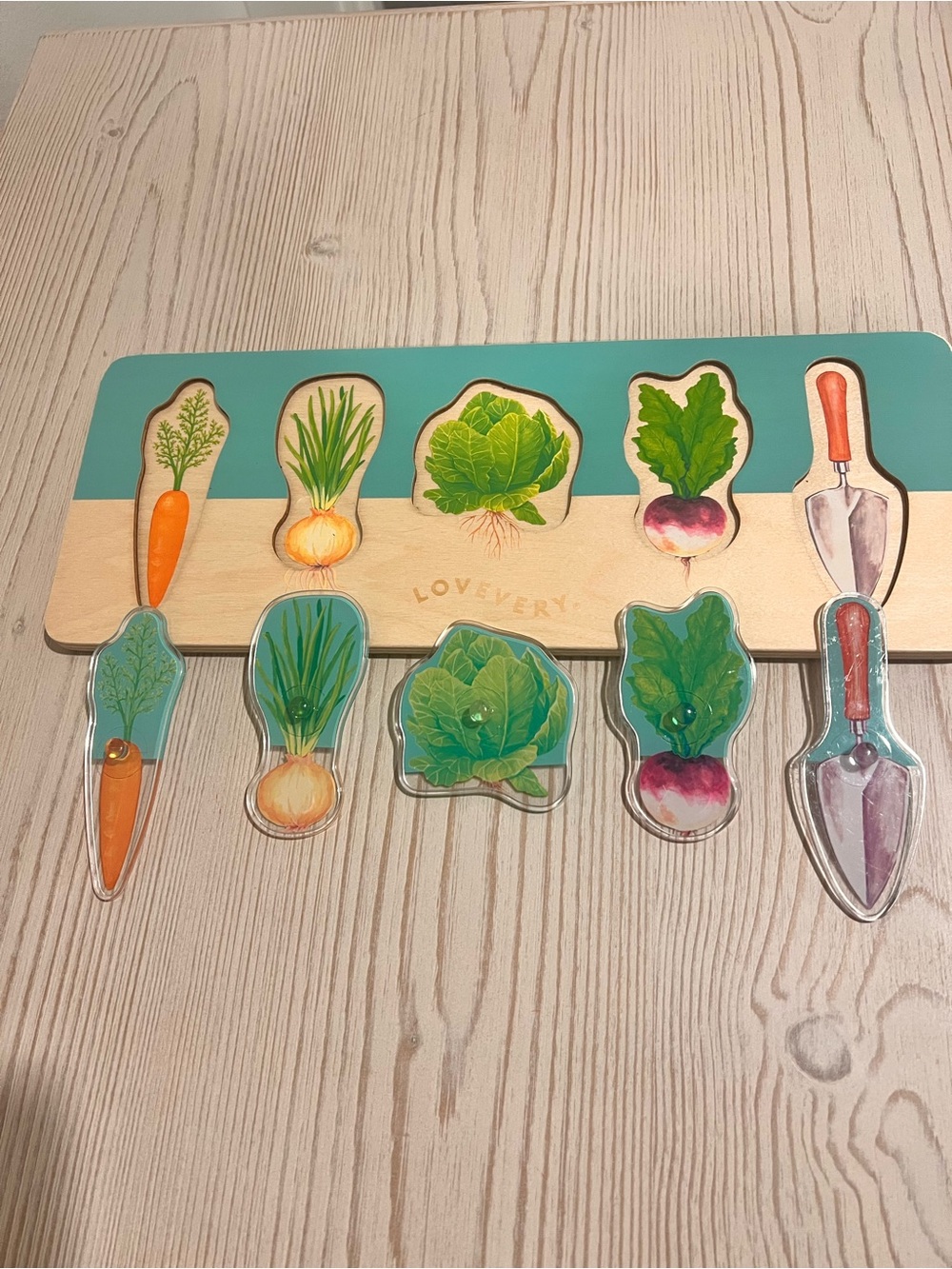 Lovevery Montessori Teal and Natural Wooden Garden Puzzle – Vegetable Set